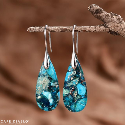 Teardrop earrings to protect ocean energy