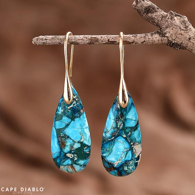 Teardrop earrings to protect ocean energy