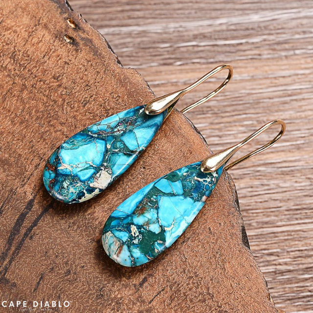 Teardrop earrings to protect ocean energy